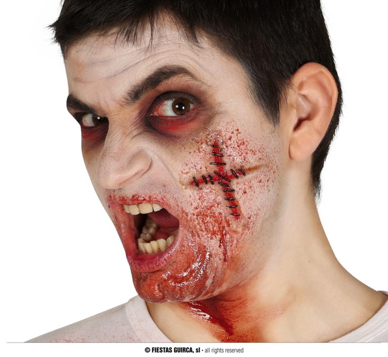 Cicatrice latex croix cousue avec colle