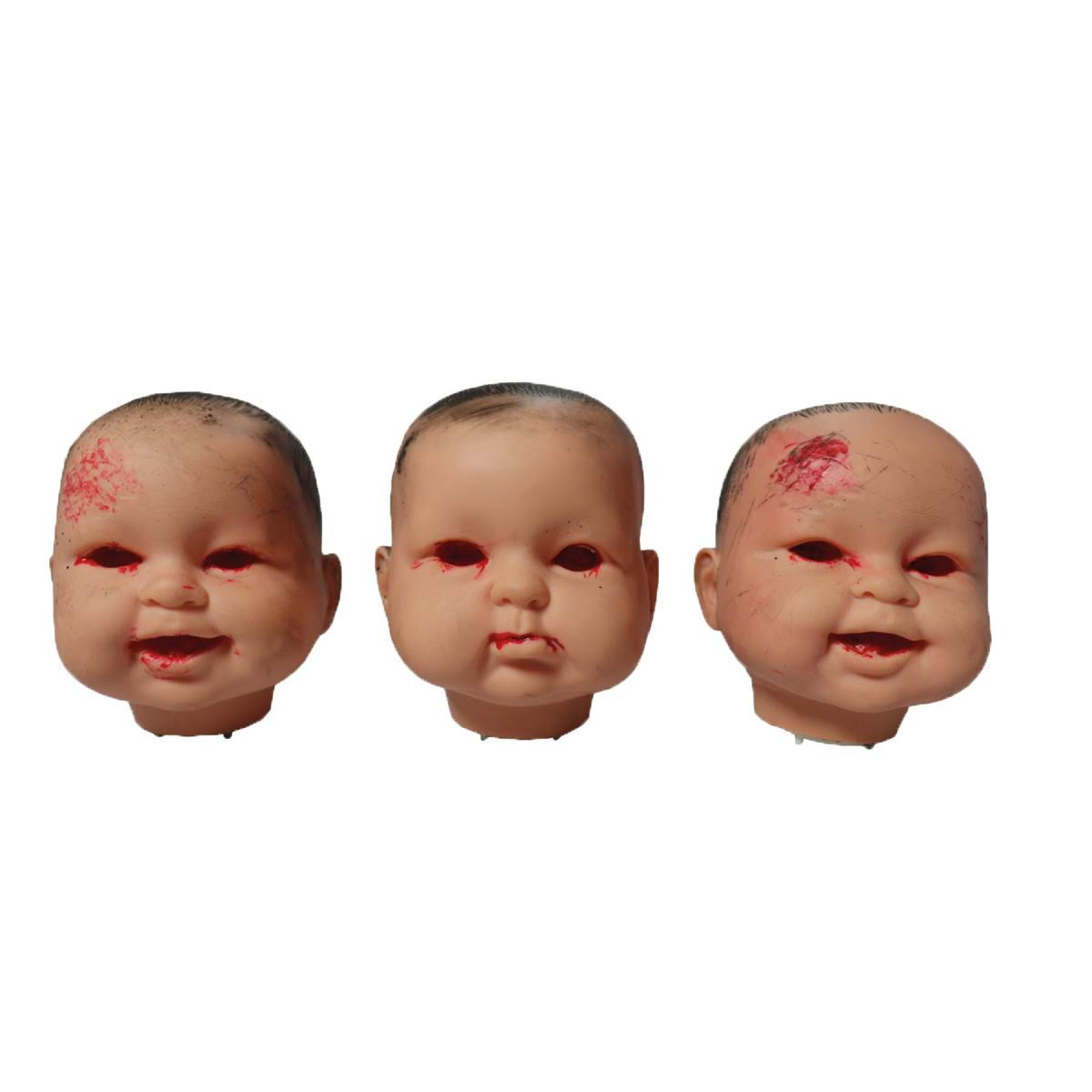 Tête de bébé décoration yeux rouges lumineux
